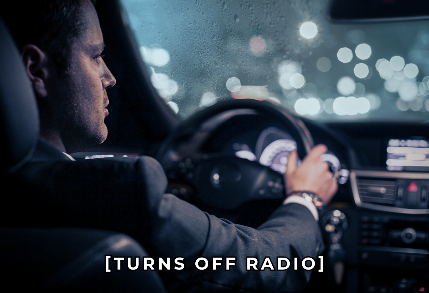 A man driving in the rain